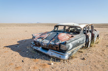 Wreck Of Classic Saloon Car Abandoned Deep In The Namib Desert Of Angola