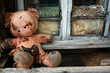 old toy bear in the ruins