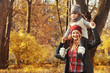 © Africa Studio - Mother and daughter playing in beautiful autumn park