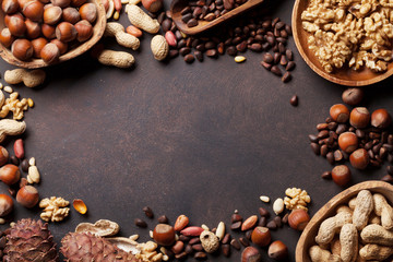 Various nuts on stone table