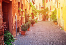 View Of Old Town Italian Street In Trastevere With Sunshine, Rome, Italy