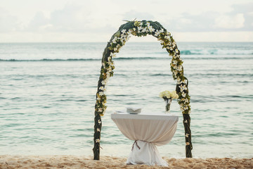 Wall Mural - beautiful delicate arch on the coast near blue sea