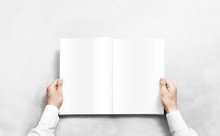 Hand Opening White Journal With Blank Pages Mockup. Arm In Shirt Holding Clear Magazine Template Mock Up.
