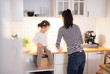 © Halfpoint - Mother with her daughter in the kitchen cooking together