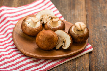 Wall Mural - Mushrooms on a rustic wooden table. Copyspace.