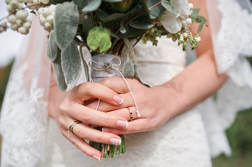 Wall Mural - bride holding a beautiful bridal bouquet