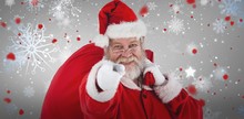 Composite Image Of Close-up Portrait Of Santa Claus Pointing Whi