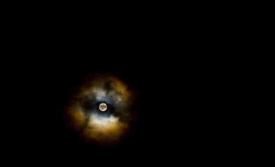 Wall Mural - close up of full moon on dark sky background