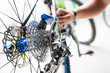 © torwaiphoto - Technical expertise taking care a gear bicycle Shop