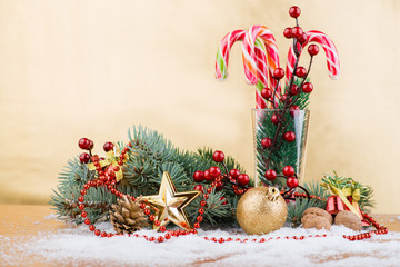 Wall Mural - Christmas still life, spruce and cones, ball, candy canes in the