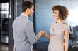 © WavebreakMediaMicro - Businessman shaking hands young woman