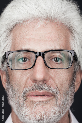 Eyewear Concept Portrait Of 60 Year Old Man With Silver Hair