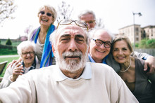 Group Of Senior Looking In Camera For A Portrait.  Funny Selfie Of A Group Of Old Friends 