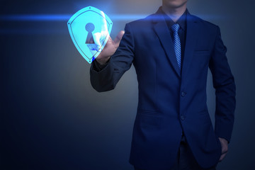 businessman touching padlock, business security concept