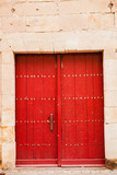 Fototapeta Desenie - Old door with wrought iron decoration
