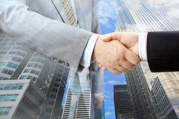Aufkleber - Closeup of handshake on urban background 