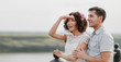 © EdNurg - Happy couple man and woman looking into the distance