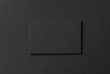 Mockup Of Blank Business Card At Black Textured Background.