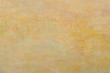Abstract light yellow vintage oil painting background on canvas  with brush strokes.