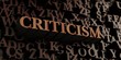 Criticism - Wooden 3D rendered letters/message.  Can be used for an online banner ad or a print postcard.