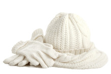  A White Knitted Hat, Scarf And Gloves  Isolated On White Background.