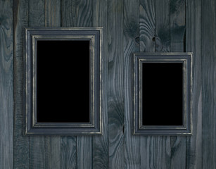 Wall Mural - Vintage photo frames on wooden plank wall