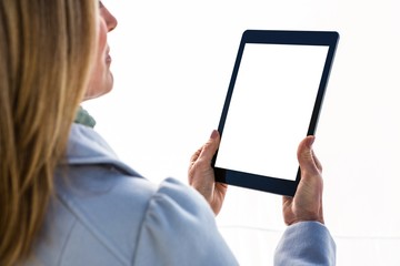Aufkleber - Woman using a tablet