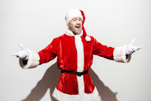 Happy Man Santa Claus Standing And Showing Welcome Gesture