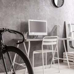 Wall Mural - Grey minimalist room with black bike