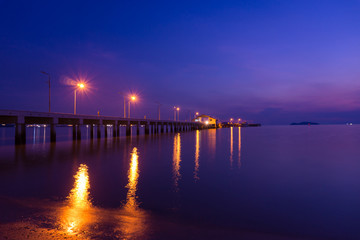 Wall Mural - twilight landscape of pier on the sea.at sattahip beach,Chonburi,Thailand.