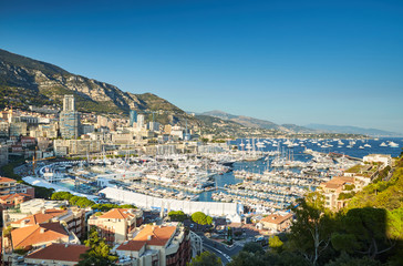 Wall Mural - World Fair MYS Monaco Yacht Show, Port Hercules, luxury megayachts, many shuttles, taxi boat, presentations, Journalists, boat traffic, Azur water, aerial view, cityscape, mountains on background