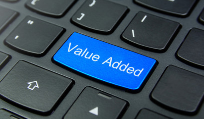 business concept: close-up the value added button on the keyboard and have azure, cyan, blue, sky co