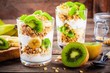 Healthy breakfast: yogurt parfait with granola, banana and kiwi