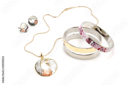 Fotografie, Obraz Earrings, pendant and bracelets on white background - fashion jewelry set