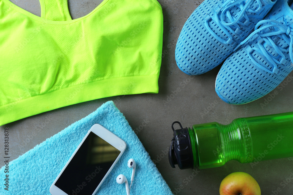 Clothes and items for sport on table