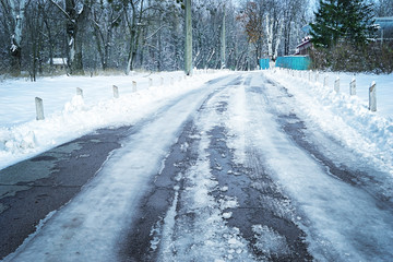 Canvas Print - Road through park on winter day