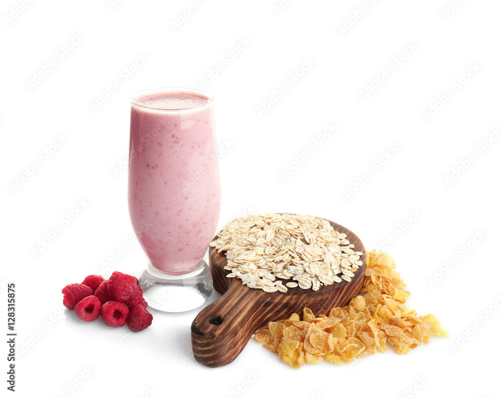Fresh raspberry milkshake with oatmeal and corn flakes isolated on white
