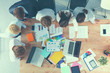 © lenets_tan - Business people sitting and discussing at meeting