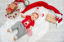 Christmas Baby Girl Six Months On The Eve Of Christmas With Gift