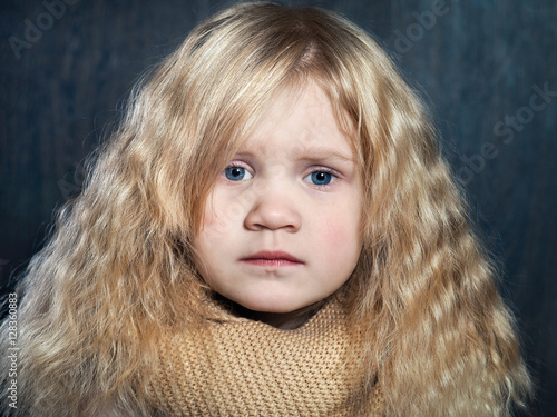 Portrait Of Sad Little Girl Is Very Beautiful Fluffy Blonde Hair