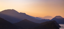 Silhouettes Of Layered Mountains At Sunset, Nature Landscape