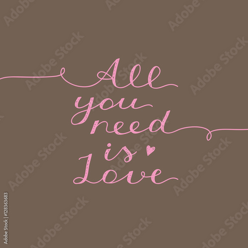 фотография all you need is love, vector lettering on brown background