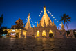 Thailand temple stupa at night with light up