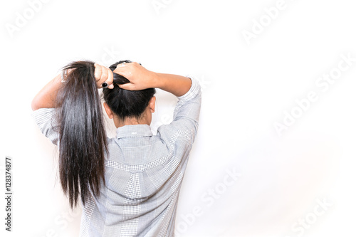 Backside Of Long Hair Woman On White Background With Copy Space
