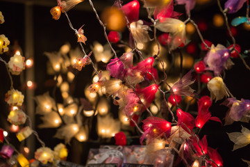 Christmas lights decorations at Southwark open market in London. Christmas background
