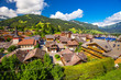 Old city center of Gstaad village, famous ski resort in Swiss Alps, canton Bern, Switzerland