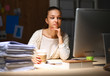 © shefkate - Young woman working in office, sitting at desk