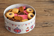 A tin filled with a variety of biscuits