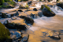 A Long Exposure Of West Maroon Creek Cascading Around Moss-cover