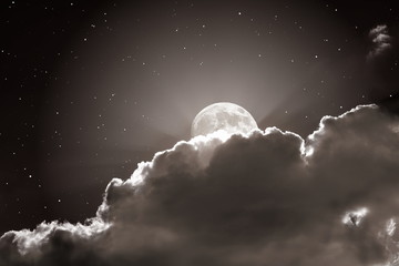 Wall Mural - starry night sky with clouds and full moon